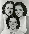 Judy Garland with her sisters known as Gumm Sisters and later the Garland Sisters