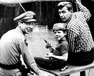 Don Knotts as Barney, Andy Griffith, and Ron Howard as Opie Taylor Fishing together on the Andy Griffith  Show